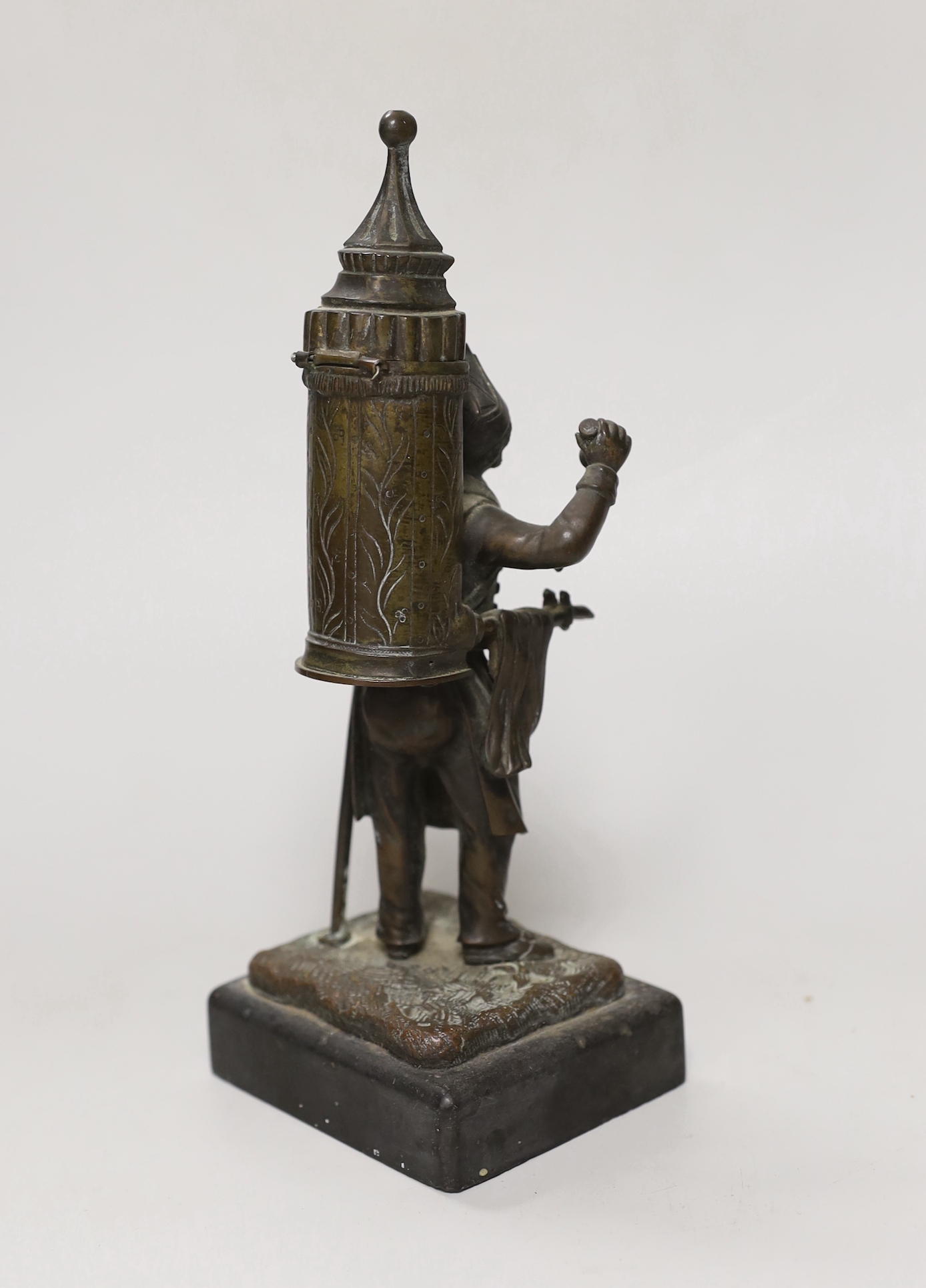 An early 20th century bronze figural match holder, on slate plinth, 20cm